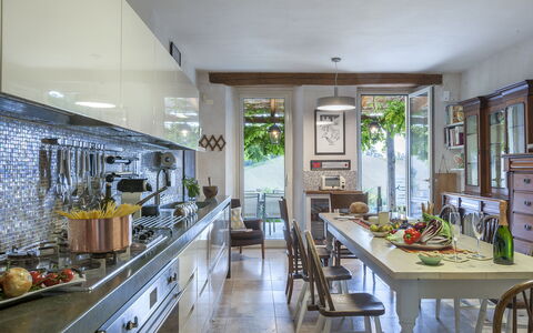 Casa Sant'Elia 7+3: Furniture, Kitchen, Interior Design, Countertop, Wood, Flooring, Cabinetry, Home, Lighting, Chair