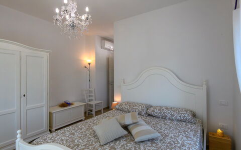 Villa Isola 8+2: Furniture, Interior Design, Bed, Bedroom, Floor, Wall, Flooring, Wood, Room, Bed Sheet