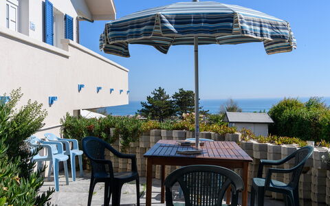 Villa Alma 8+2: Blue, Furniture, Outdoor Furniture, Umbrella, Shade, Sea, Chair, Outdoor Table, Ocean, Resort