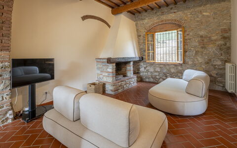 Casale le Lupe Apartments: Wall, Interior Design, Furniture, Flooring, Floor, Ceiling, Room, Lighting, Living Room, Home