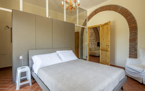 Casale le Lupe Apartments: Wall, Interior Design, Furniture, Bedroom, Flooring, Floor, Ceiling, Bed, Room, Lighting