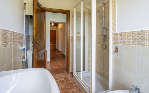 Casale le Lupe Apartments: Flooring, Plumbing Fixture, Floor, Interior Design, Ceiling, Bathroom, Plumbing, Tap, Room, Door