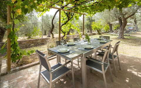 Casale le Lupe Apartments: Furniture, Table, Kitchen & Dining Room Table, Outdoor Furniture, Outdoor Table, Chair, Restaurant, Shade, Patio, Garden