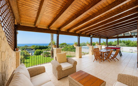 Villa Patrizia: Furniture, Floor, Flooring, Porch, Resort, Chair, Shade, Eco Hotel, Outdoor Furniture, Balcony