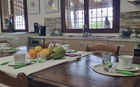 Villa Patrizia: Furniture, Interior Design, Wood, Table, Flooring, Kitchen & Dining Room Table, Chair, Dining Room, Countertop, Tableware