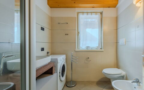 Rugia: Flooring, Interior Design, Floor, Plumbing Fixture, Wall, Wood, Bathroom, Ceiling, Sink, Room