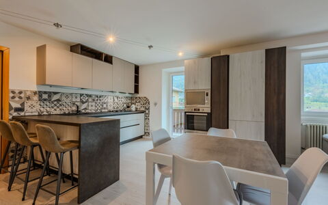 Federica: Furniture, Interior Design, Flooring, Floor, Wood, Countertop, Ceiling, Kitchen, Wood Flooring, Light Fixture