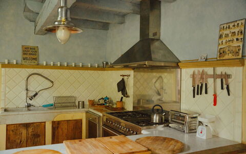 La Cenerara: Kitchen, Flooring, Wood, Interior Design, Countertop, Kitchen Appliance, Floor, Kitchen Stove, Ceiling, Furniture