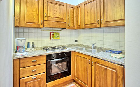 Certaldo: Countertop, Cabinetry, Room, Property, Kitchen, Furniture, Yellow, Real Estate, Building, Home