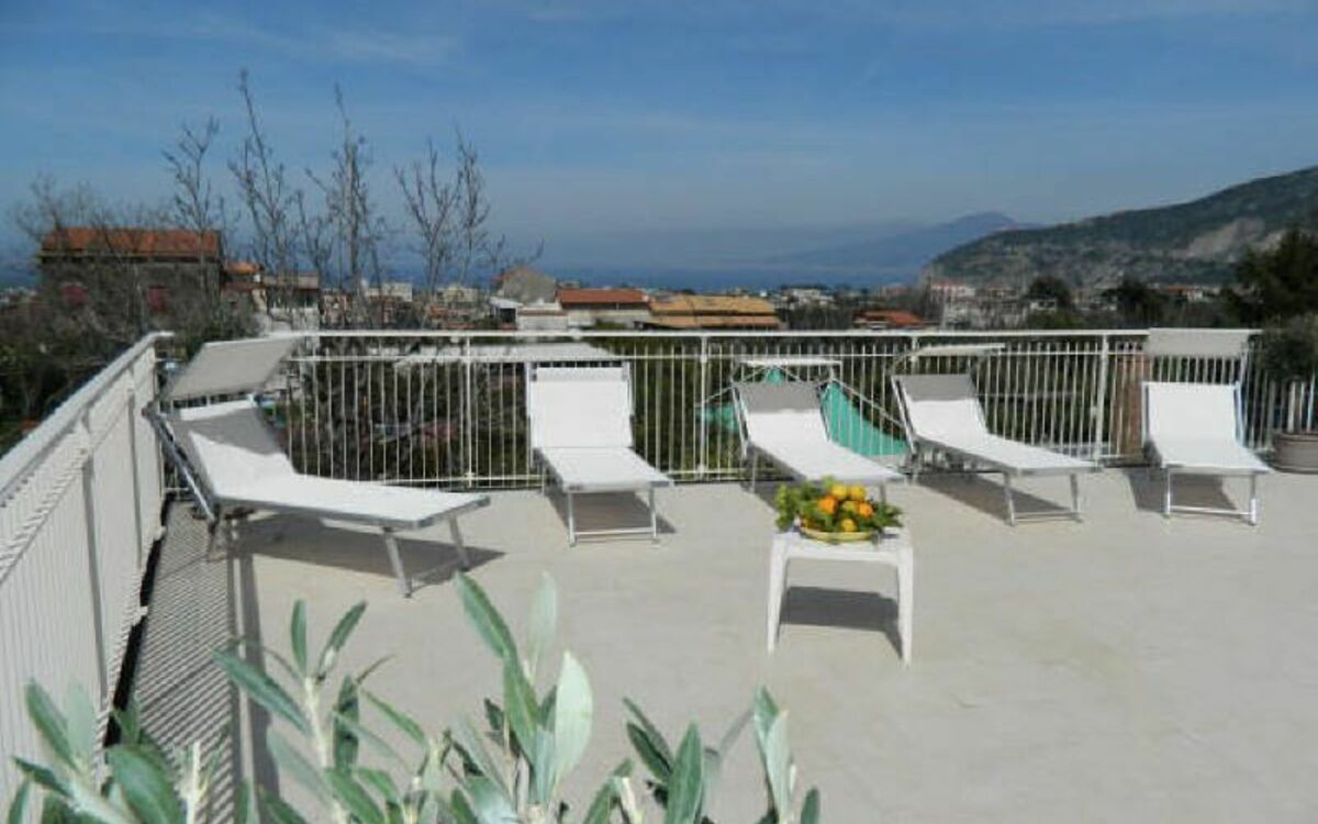 Exclusive Terrace Solarium equipped with sun beds, sun chairs, shower, tables, chairs, barbecue