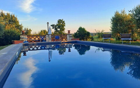 Fattoria la Gabola: Water, Sky, Plant, Water Resources, Property, Cloud, Blue, Azure, Tree, Architecture