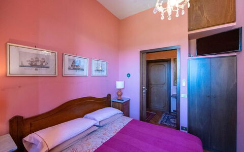 Casa Grion: Wall, Interior Design, Floor, Bedroom, Door, Pink, Bed, Apartment, Bed Sheet, Bed Frame