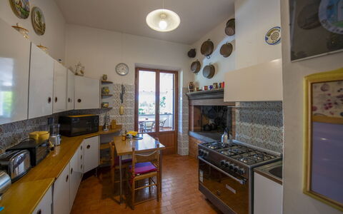 Casa Grion: Interior Design, Wood, Flooring, Kitchen, Furniture, Countertop, Room, Ceiling, Floor, Kitchen Appliance