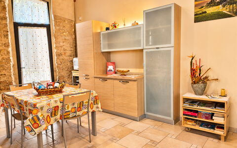 Pieve di Sant Ippolito: Furniture, Interior Design, Flooring, Wood, Floor, Kitchen, Major Appliance, Room, Countertop, Ceiling