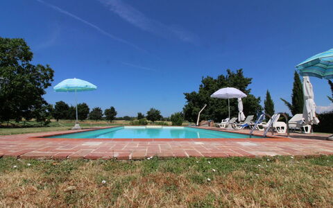 Il Viaggiolo: Sky, Plant, Swimming Pool, Cloud, Tree, Water, Building, Shade, Arecales, Land Lot