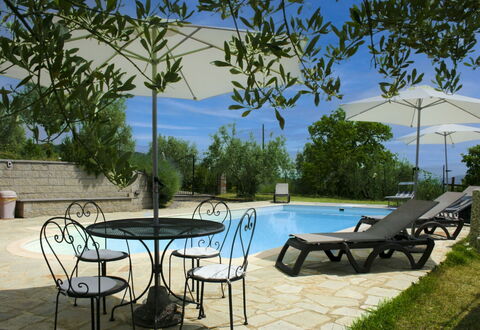 La Rogaia: Umbrella, Furniture, Outdoor Furniture, Shade, Chair, Outdoor Table, Flowerpot, Swimming Pool, Design, Houseplant
