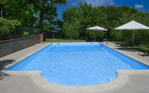 Podere San Bono: Swimming Pool, Blue, Resort, Composite Material, Leisure, Outdoor Furniture, Shade, Water Feature, Eco Hotel, Tile