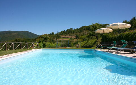 Borgo Antico: Water, Sky, Plant, Swimming Pool, Building, Nature, Azure, Tree, Natural Landscape, Outdoor Furniture