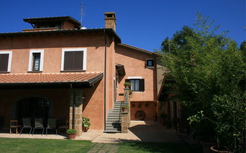 Villa Iris: Plant, Sky, Building, Property, Window, House, Stairs, Tree, Cottage, Residential Area