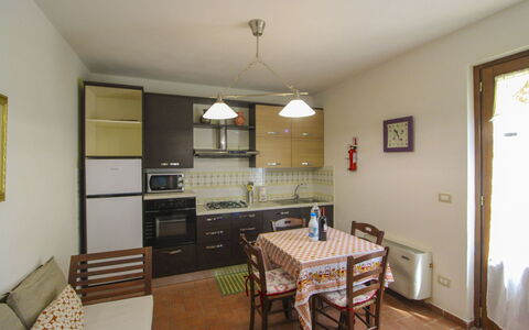 Podere Marcigliano: Furniture, Interior Design, Flooring, Floor, Wood, Ceiling, Room, Kitchen & Dining Room Table, Chair, Dining Room