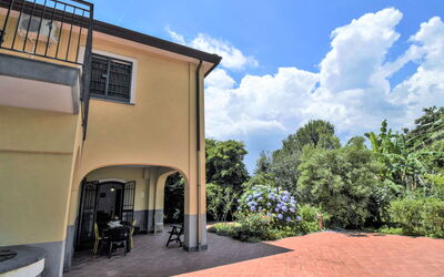 Mascali 110: Cloud, Sky, Plant, Property, Shade, Building, Land Lot, Tree, Road Surface, Asphalt