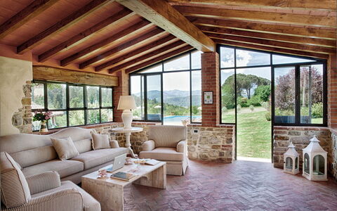 Villa Sant' Angelo: Furniture, Interior Design, Wood, Couch, Home, Ceiling, Flooring, Table, Floor, Living Room