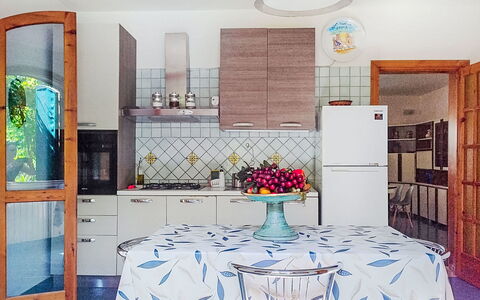 Orchidea: Furniture, Interior Design, Flooring, Floor, Lighting, Kitchen, Room, Home, Chair, Light Fixture