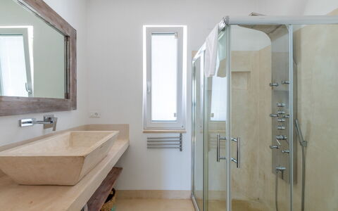 Villa Butterfly: Mirror, Plumbing Fixture, Property, Building, Shower Door, Tap, Shower Head, Sink, Bathroom