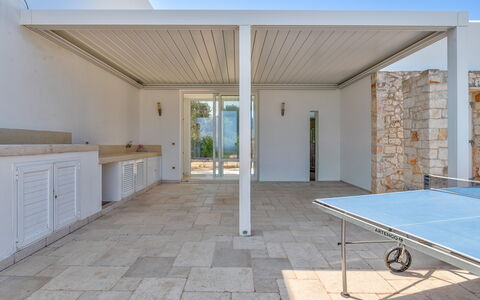 Villa Butterfly: Floor, Flooring, Composite Material, Porch, Shade, Outdoor Structure, Tile, Concrete, Outdoor Furniture, Deck