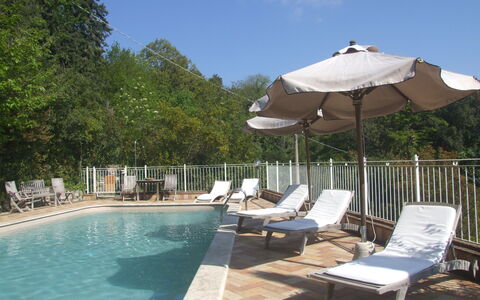 Villa Il Castagno: Water, Sky, Plant, Furniture, Swimming Pool, Umbrella, Outdoor Furniture, Shade, Tree, Building